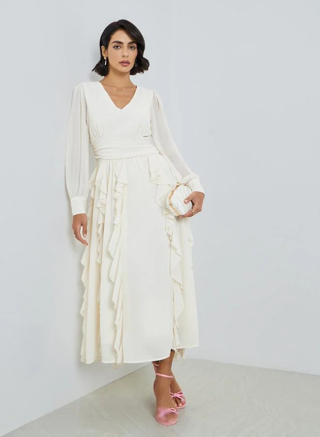 ستايلي فستان ميدي نسائي بتفاصيل كشكشة وحافة واسعة